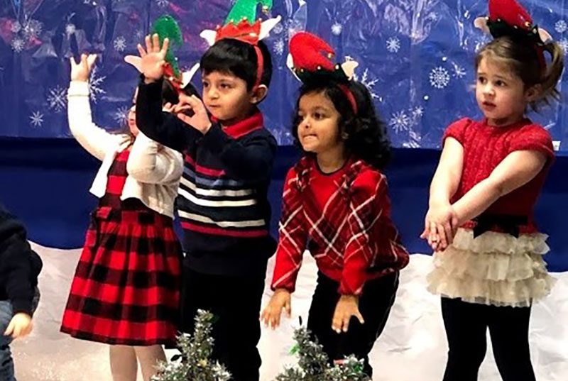 Students from Sugar Mill Montessori School putting on a Christmas Play