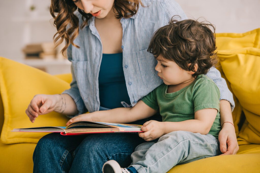 mother and son reading a book